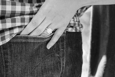 Hand in pocket showing engagement ring