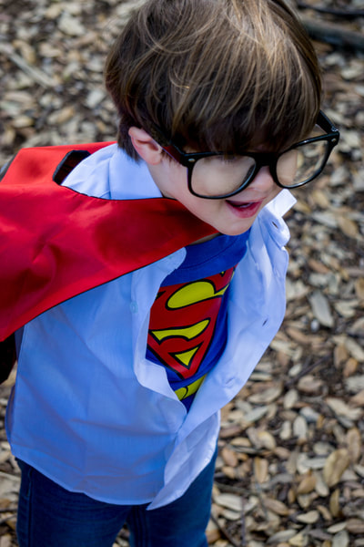Ollie as Clark Kent and Superman